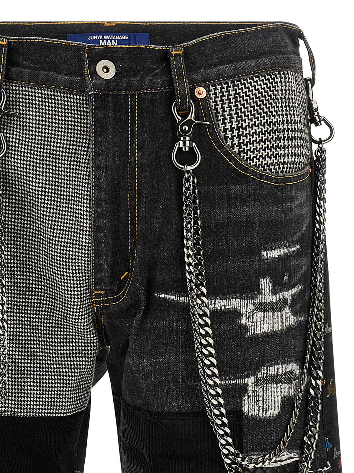 Discover the avant-garde Junya Watanabe Blue Cotton Jeans, where bold patchwork artistry meets luxurious craftsmanship, redefining modern denim elegance.
