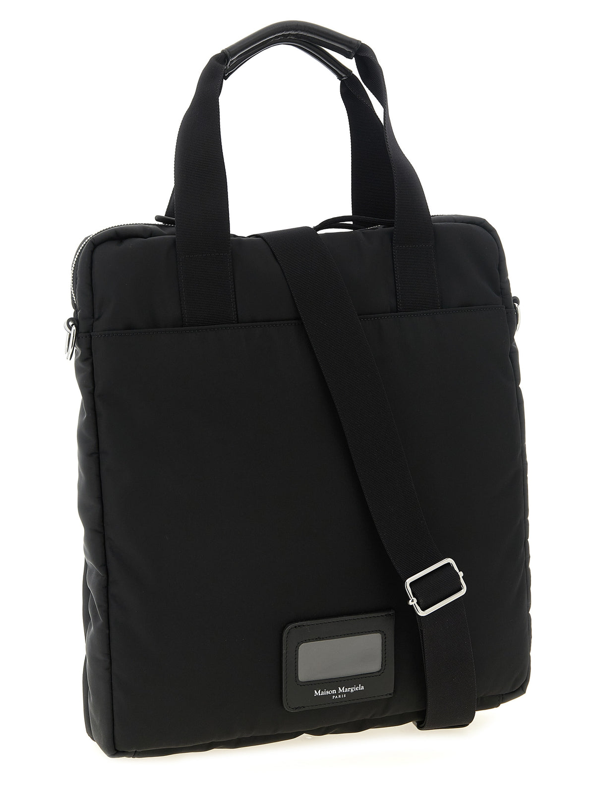 Discover the Maison Margiela Black Polyamide Tote Bag, a fusion of industrial elegance and timeless allure, perfect for the discerning individual seeking sophistication.