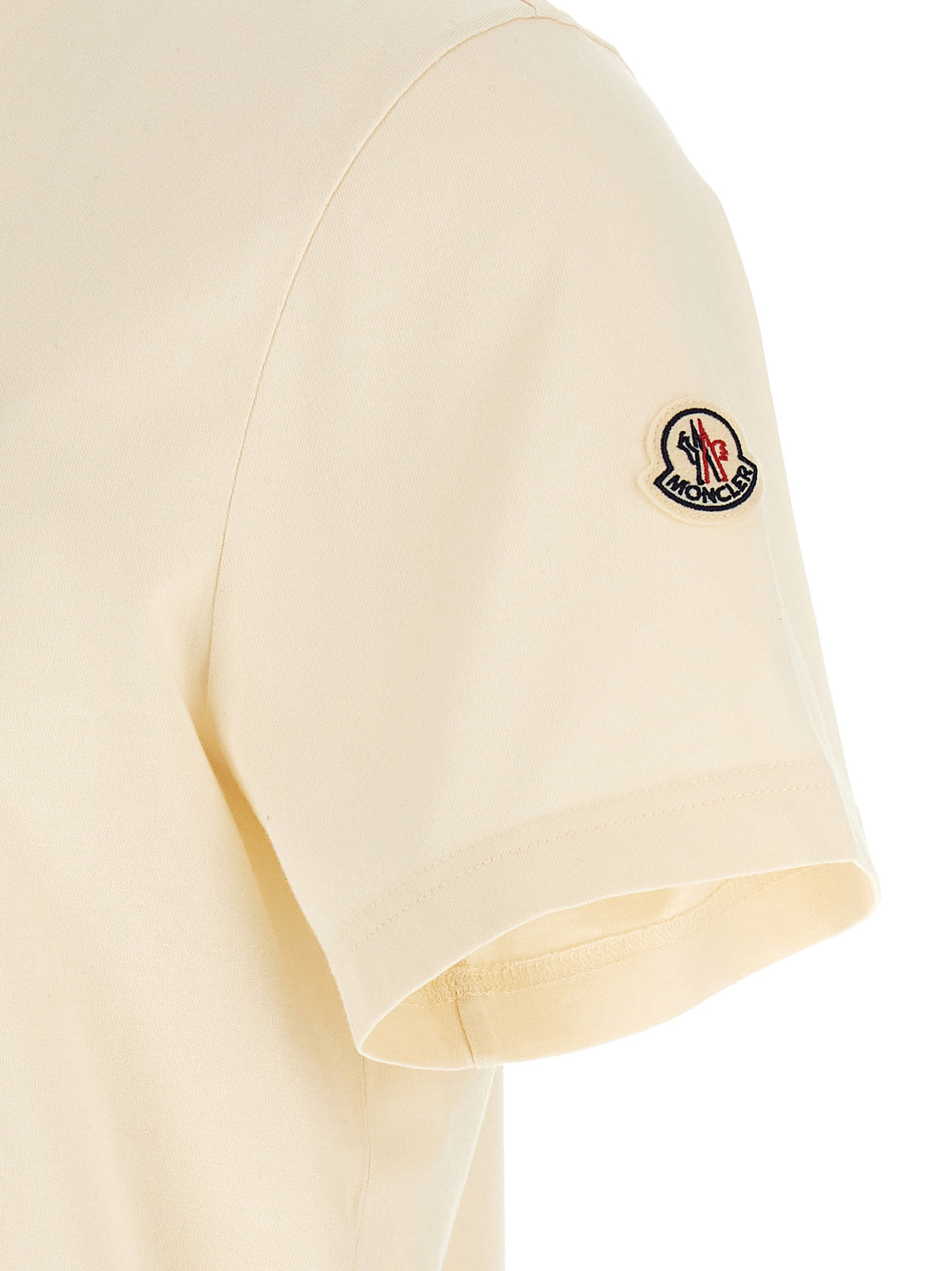 Discover the Moncler White Cotton T-Shirt, an embodiment of refined elegance and impeccable craftsmanship, perfect for those who appreciate timeless luxury.