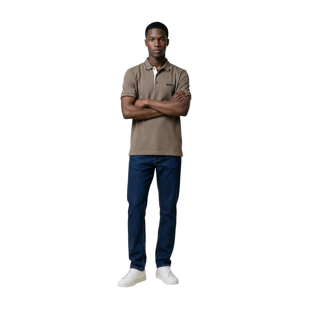 Indulge in the refined elegance of the Hugo Boss Beige Cotton Polo Shirt, where superior craftsmanship meets breathable comfort, perfect for any sophisticated occasion.