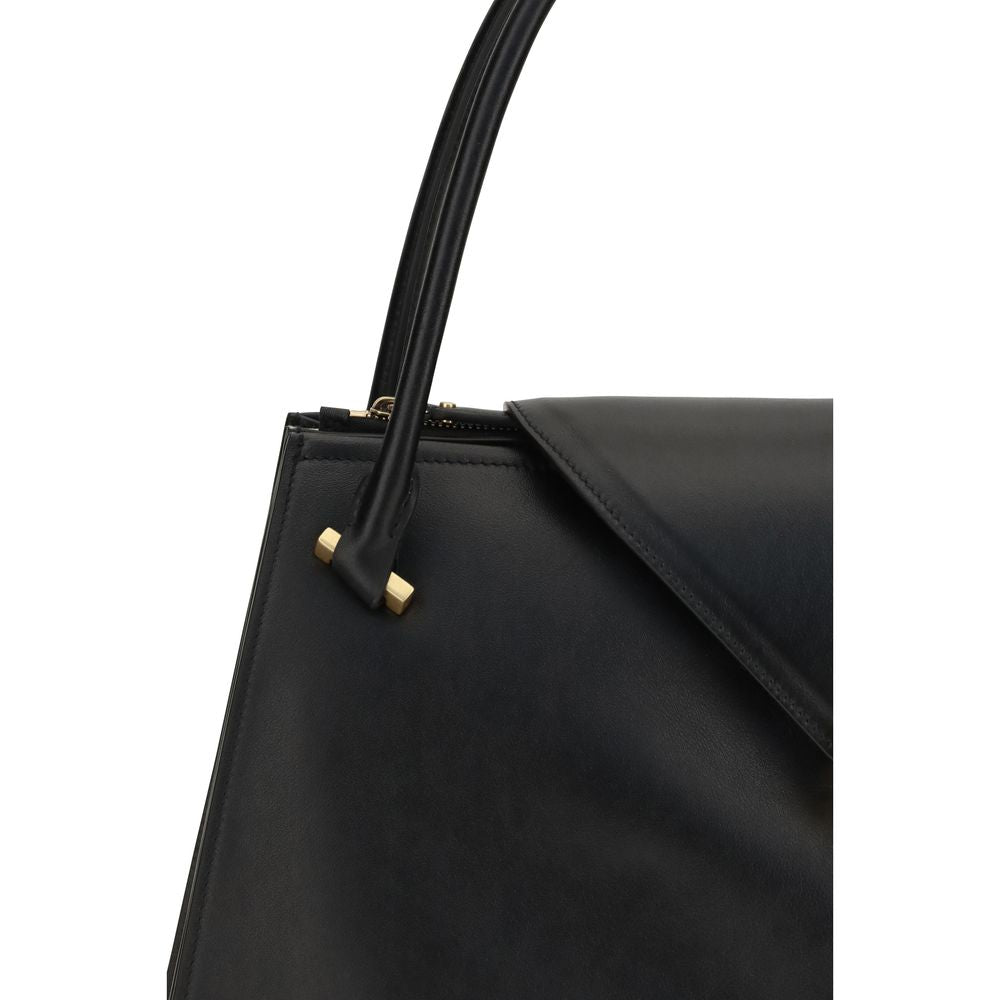 Indulge in the exquisite allure of the Versace Black Calf Leather Bos Taurus Shoulder Bag, a masterpiece of craftsmanship that embodies luxury and sophistication.