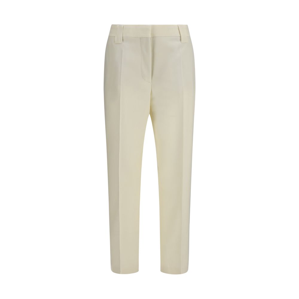 Experience the allure of Versace's Beige Wool Oves Aries Cropped Pants, where exquisite craftsmanship meets luxurious comfort, perfect for the discerning individual.