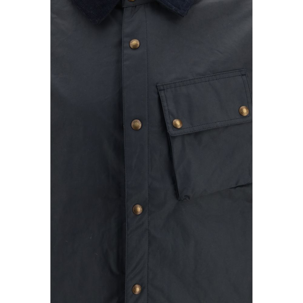 Discover the Belstaff Blue Cotton Full-Length Jacket, a masterful blend of British craftsmanship and outdoor elegance, designed for those who embrace sophistication and adventure.