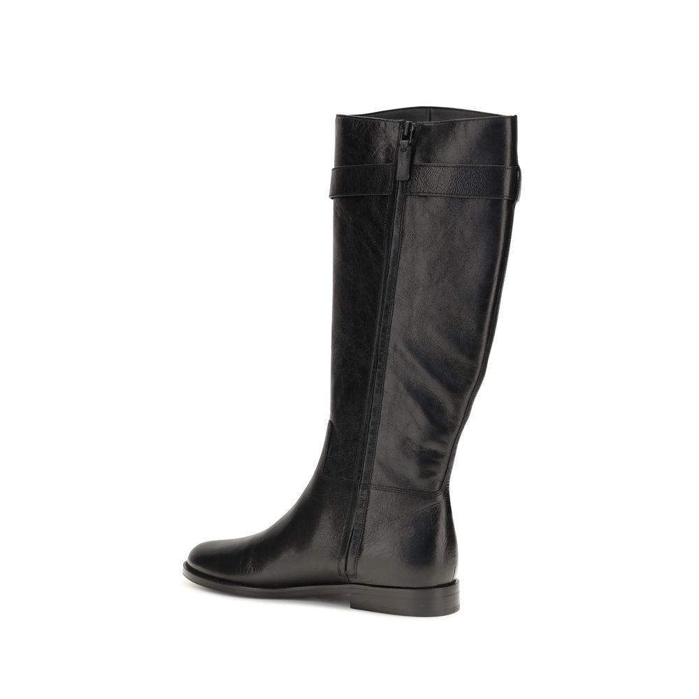 Experience the elegance of Tory Burch's Black Calf Leather Bos Taurus Lace-Up Boots, where equestrian charm meets urban sophistication, crafted for the discerning individual.