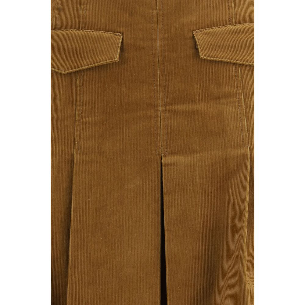 Elevate your wardrobe with the Tory Burch Brown Cotton Long Skirt, a masterful blend of refined proportions and relaxed elegance, perfect for the discerning individual.