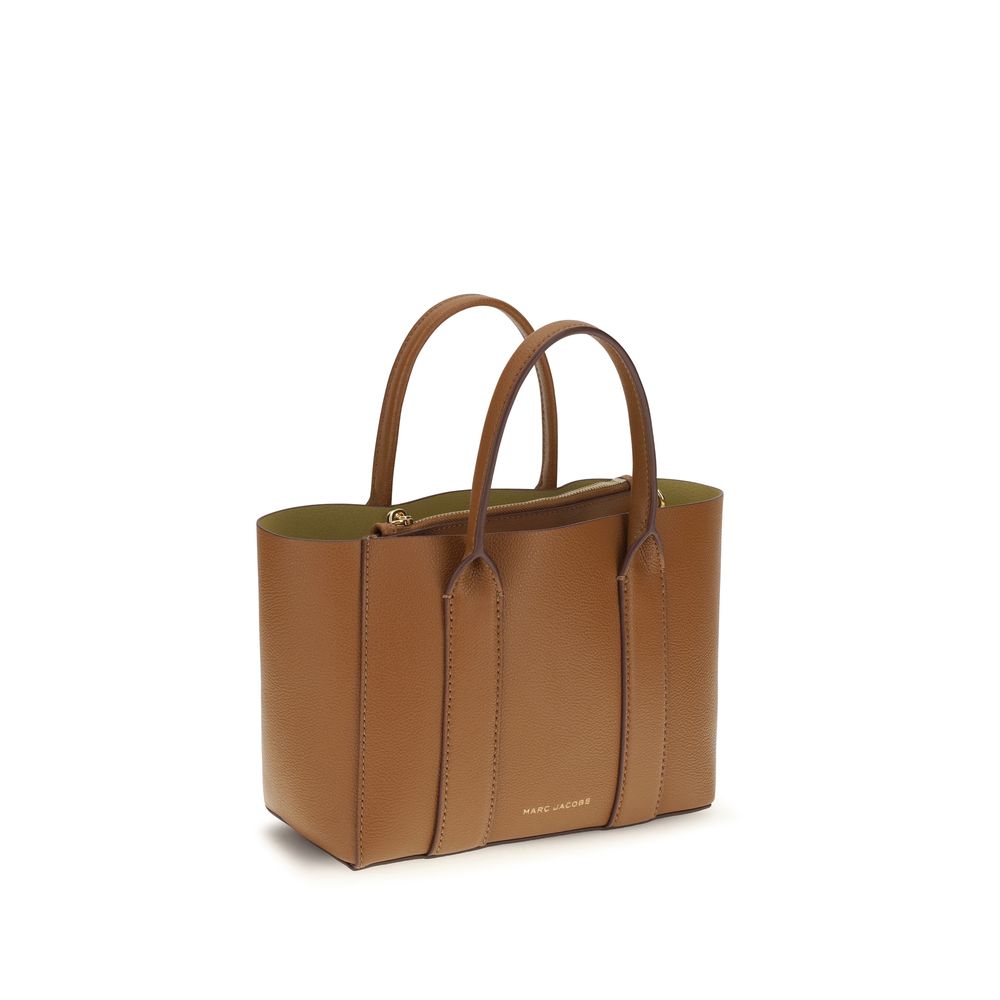 Indulge in the exquisite Marc Jacobs Brown Calf Leather Bos Taurus Shoulder Bag, a timeless companion crafted from supple pebble leather, perfect for the discerning individual.