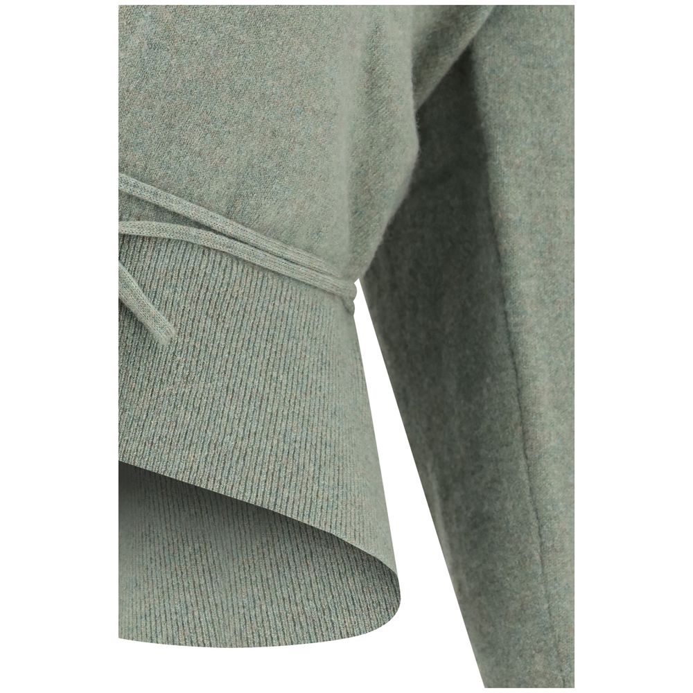 Indulge in the exquisite N°516 Ella Cardigan by Extreme Cashmere, a luxurious blend of cashmere and elegance, perfect for layering or standalone allure.