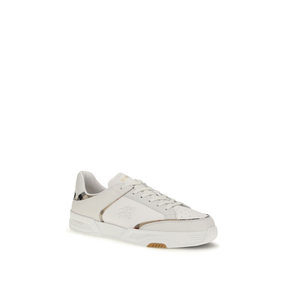 Elevate your style with Burberry's White Calf Leather Bos Taurus Low Top Sneakers, a fusion of timeless craftsmanship and modern luxury, perfect for discerning tastes.
