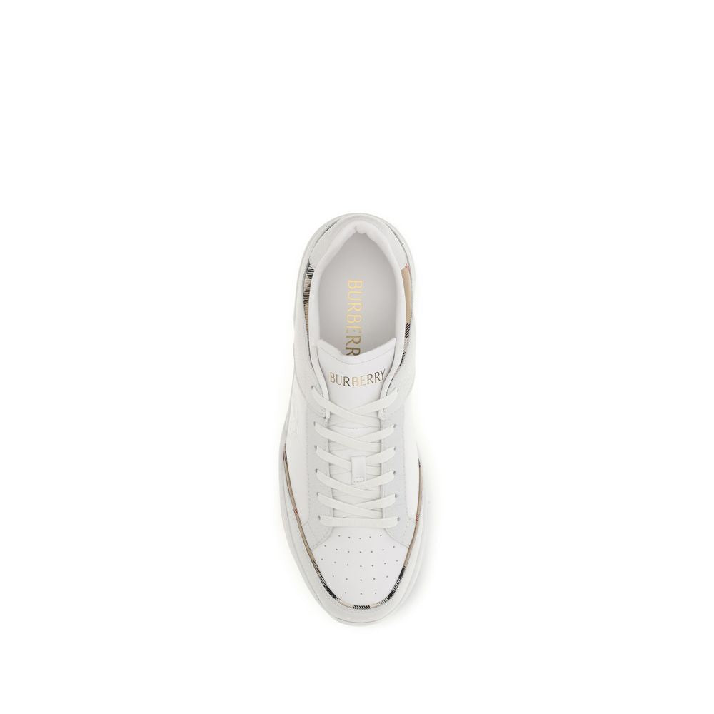 Discover the Burberry White Calf Leather Bos Taurus Low Top Sneakers, a seamless blend of elegance and comfort, embodying timeless luxury for the discerning individual.