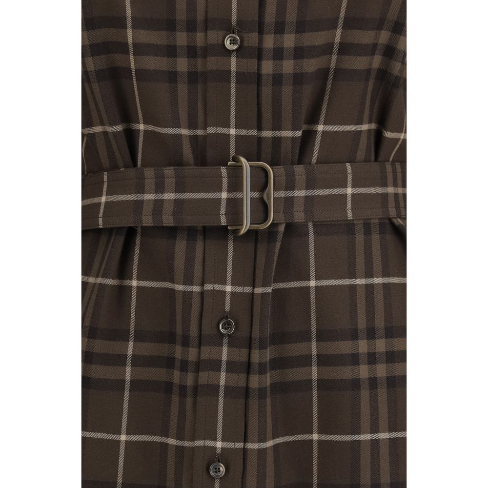 Indulge in the elegance of the Burberry Brown Cotton Casual Dress, a masterpiece of craftsmanship featuring the iconic House Check pattern, perfect for the discerning individual.