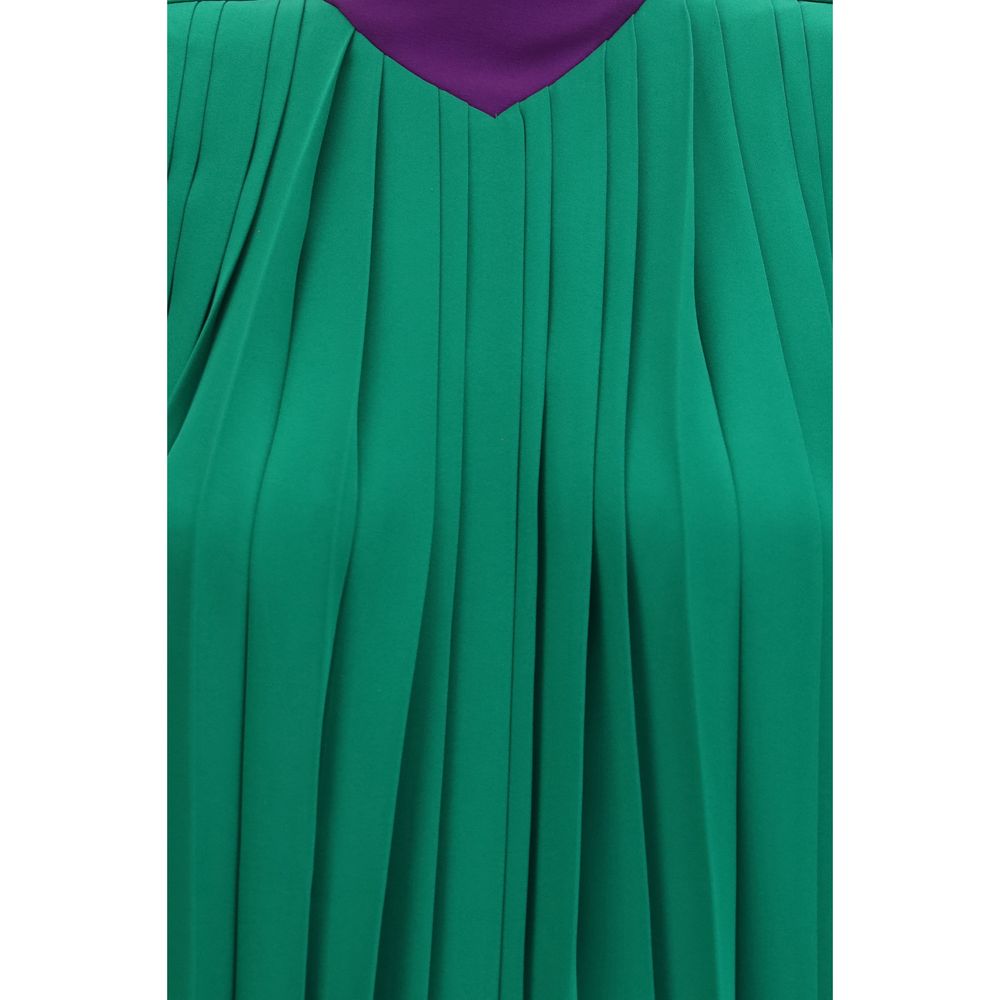 Experience the exquisite Valentino Garavani Bicolor Silk Shirt, crafted from luxurious silk georgette, embodying elegance and sophistication for the discerning individual.