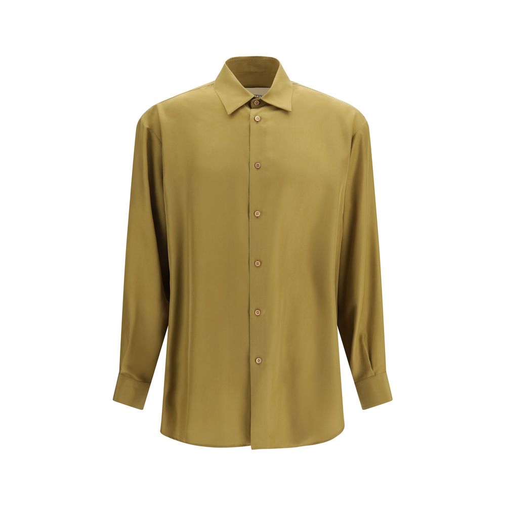 Indulge in the elegance of Valentino Garavani's Beige Silk Dress Shirt, crafted from 100% silk, embodying refined luxury and timeless sophistication for the discerning individual.
