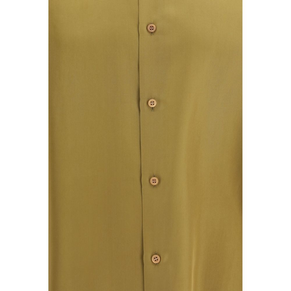 Experience the elegance of Valentino Garavani's Beige Silk Dress Shirt, crafted from pure silk for a refined silhouette that embodies luxury and sophistication.