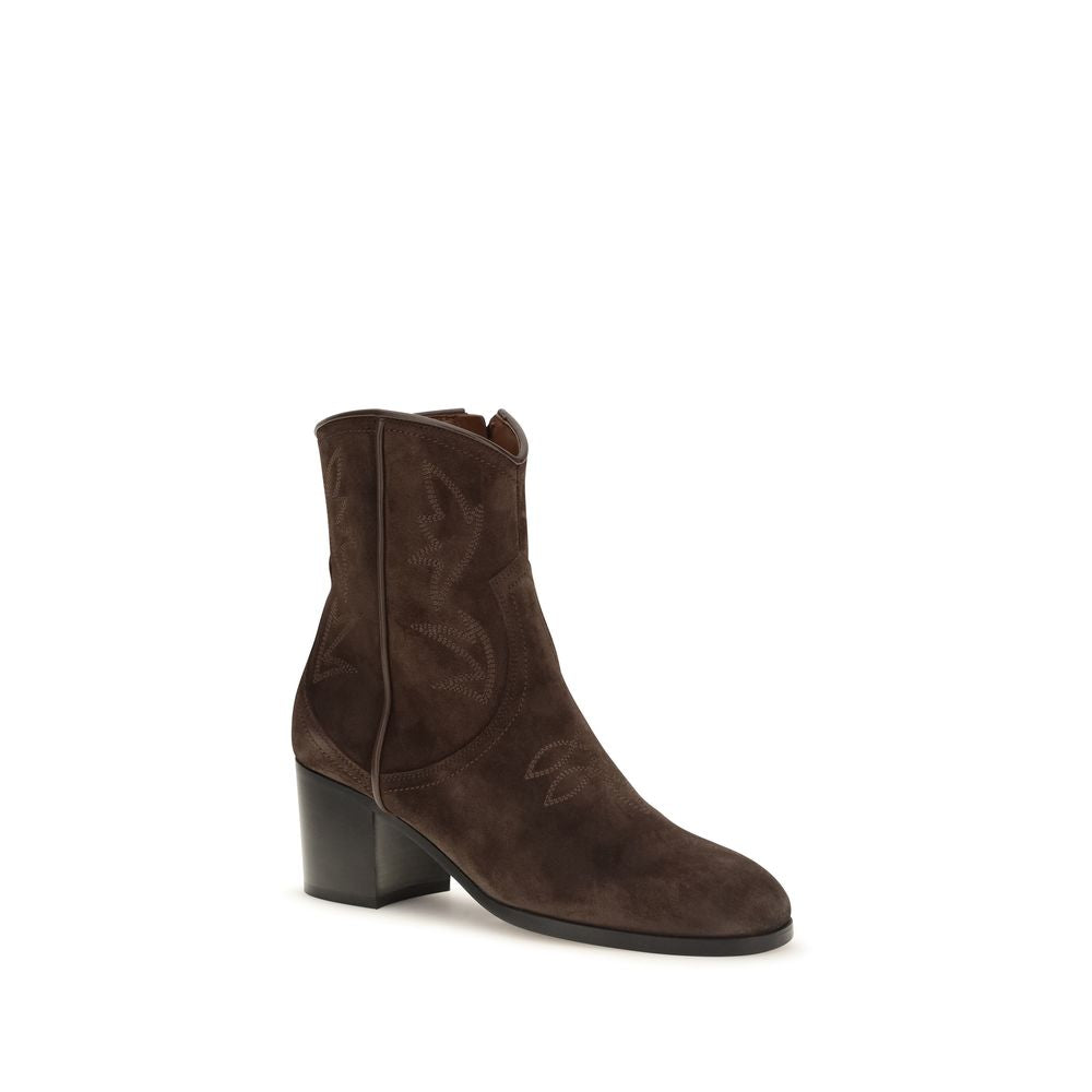 Indulge in the exquisite Zimmy suede ankle boots by Valentino Garavani, where soft suede meets refined craftsmanship, embodying timeless luxury for the discerning individual.