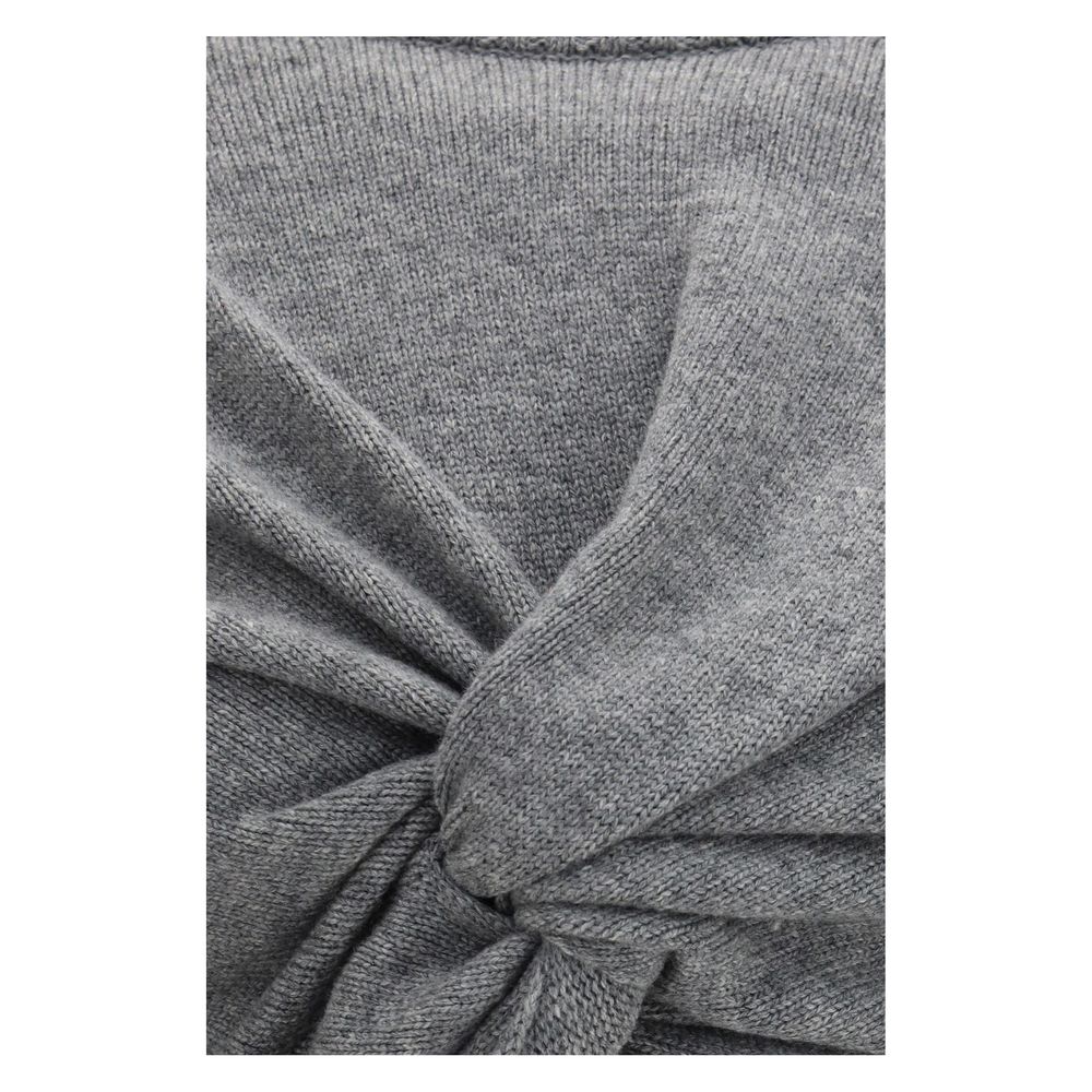 Indulge in the exquisite allure of the Balenciaga Gray Wool Oves Aries Sweatshirt, crafted from 100% wool with elegant ruched detailing, embodying timeless luxury and sophistication.