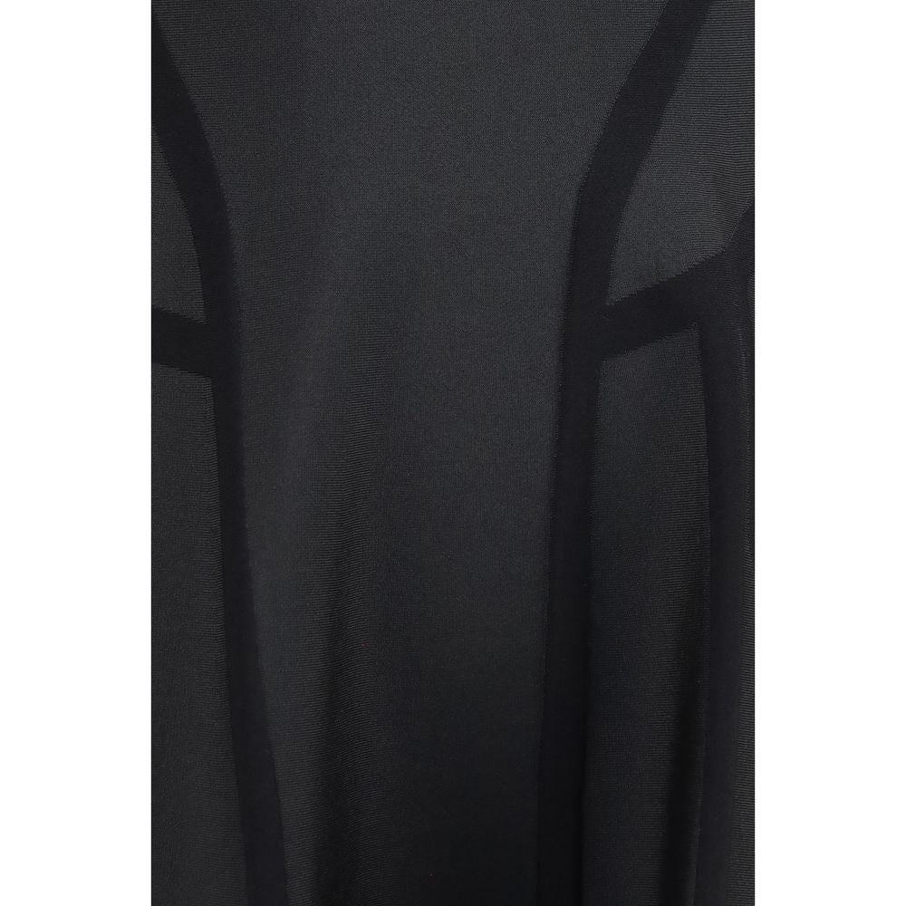 Indulge in the refined elegance of the Alexander McQueen Black Polyester Cocktail Dress, where exquisite craftsmanship meets a sculpted silhouette, perfect for the discerning individual.