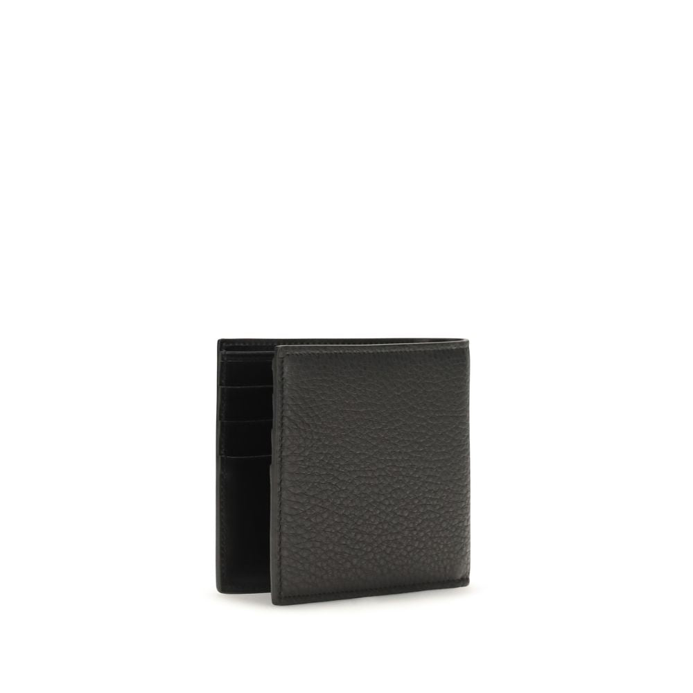 Indulge in the elegance of the Dolce & Gabbana Black Calf Leather Bos Taurus Wallet, a masterpiece of craftsmanship that embodies luxury and sophistication for discerning tastes.
