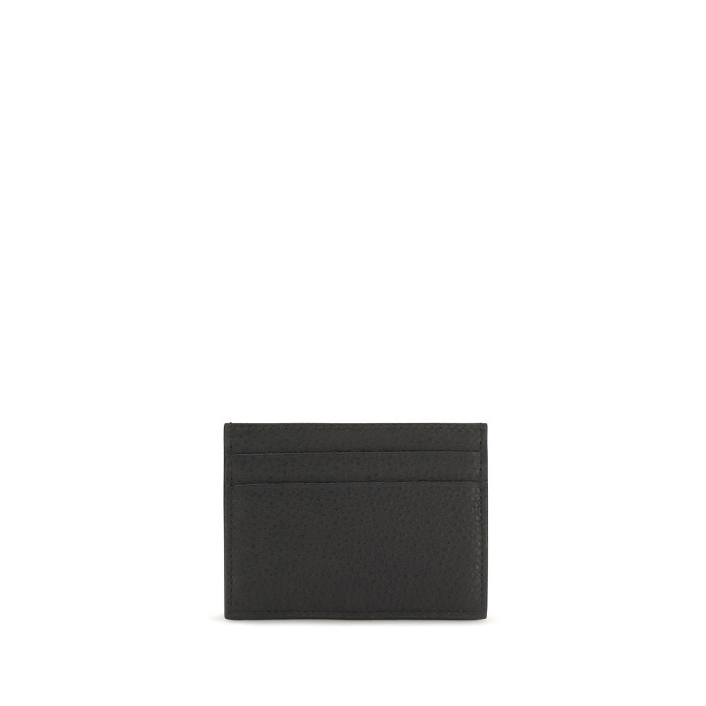 Experience the exquisite allure of the Dolce & Gabbana Black Calf Leather Bos Taurus Wallet, a symbol of refined elegance and impeccable craftsmanship for the discerning individual.