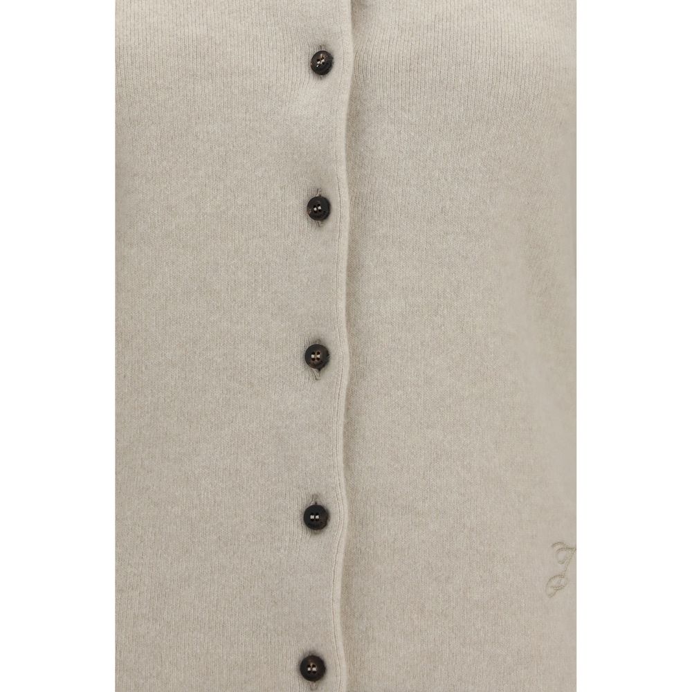 Indulge in the exquisite elegance of the Jacquemus Beige Wool Oves Aries Cardigan, a luxurious blend of wool and cashmere that embodies refined craftsmanship and timeless allure.