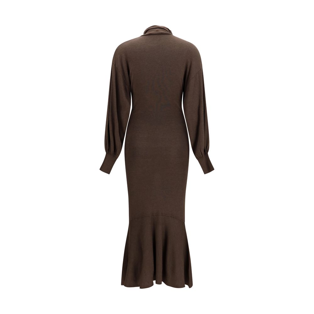 Indulge in the exquisite elegance of the Jacquemus Brown Silk Casual Dress, a masterpiece of soft knit craftsmanship that embodies fluidity and sophistication for the discerning individual.