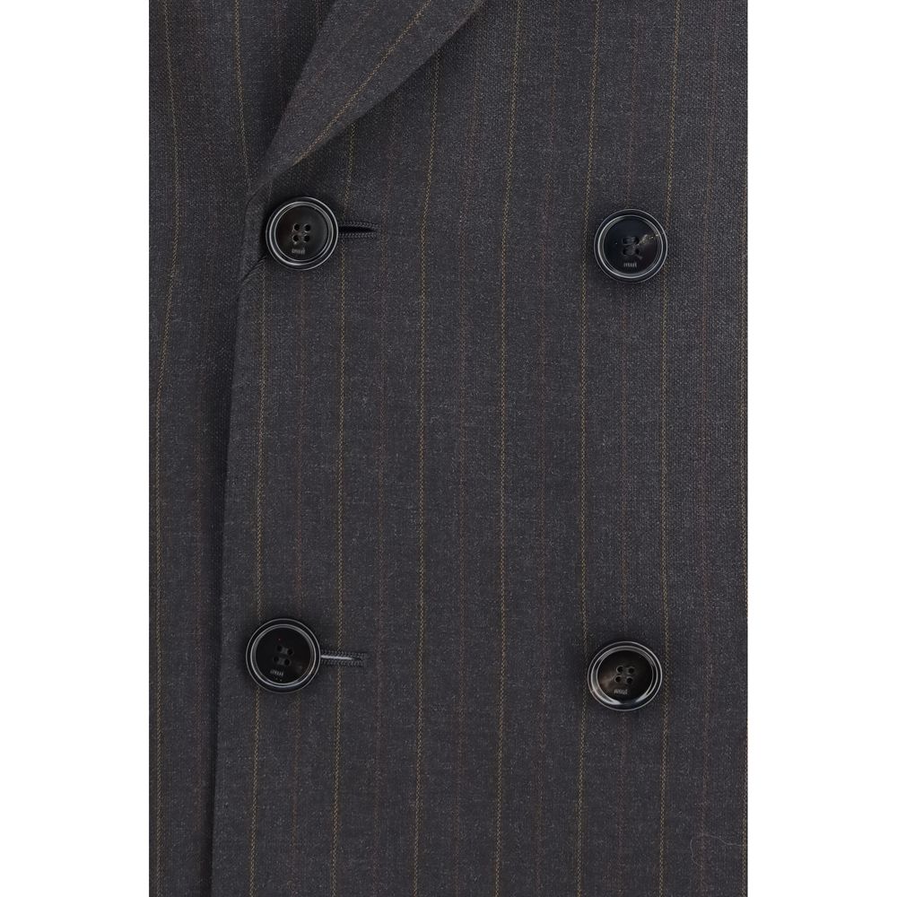 Discover the AMI Paris Gray Wool Oves Aries Blazer, a masterpiece of tailored elegance crafted from premium wool, embodying sophistication and timeless allure.