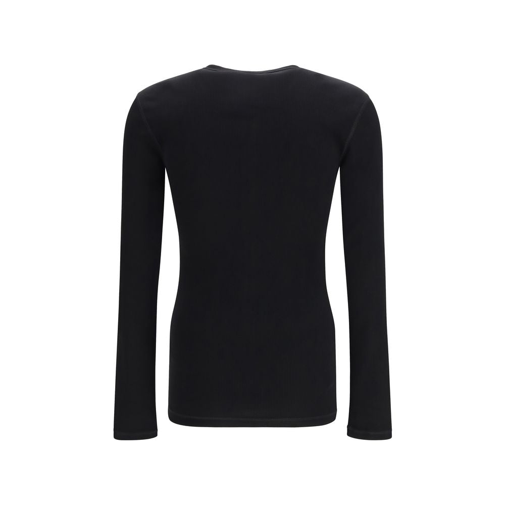 Indulge in the exquisite craftsmanship of the Dolce & Gabbana Black Cotton Long Sleeve T-Shirt, a timeless piece that embodies luxury and sophistication, perfect for any discerning wardrobe.