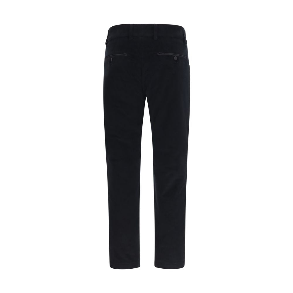 Indulge in the exquisite allure of Dolce & Gabbana's Black Cotton Casual Pants, where Italian craftsmanship meets a refined silhouette for the discerning individual.