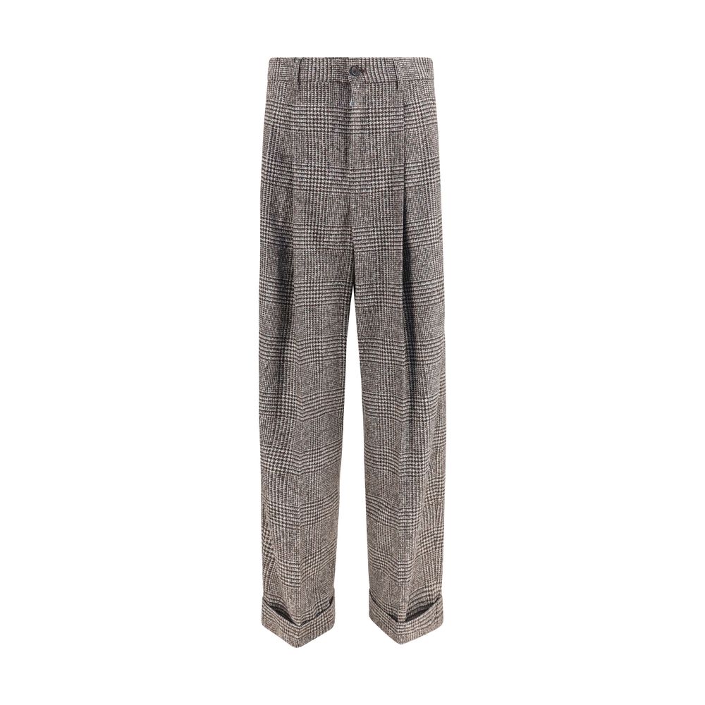 Elevate your wardrobe with Dolce & Gabbana's Brown Alpaca Vicugna Pacos Pants, a timeless blend of luxury and sophistication, perfect for the discerning individual.