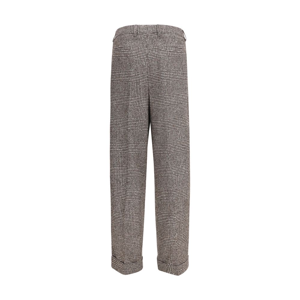 Experience the elegance of Dolce & Gabbana's Brown Alpaca Vicugna Pacos Pants, crafted from a luxurious alpaca blend, embodying timeless sophistication and refined style.