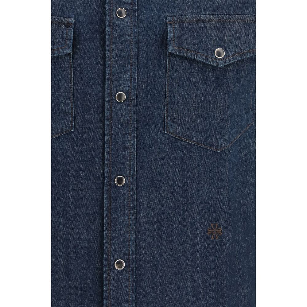Elevate your wardrobe with the Jacob Cohen Blue Denim Shirt, a masterpiece of cotton craftsmanship that embodies timeless elegance and sophisticated allure.