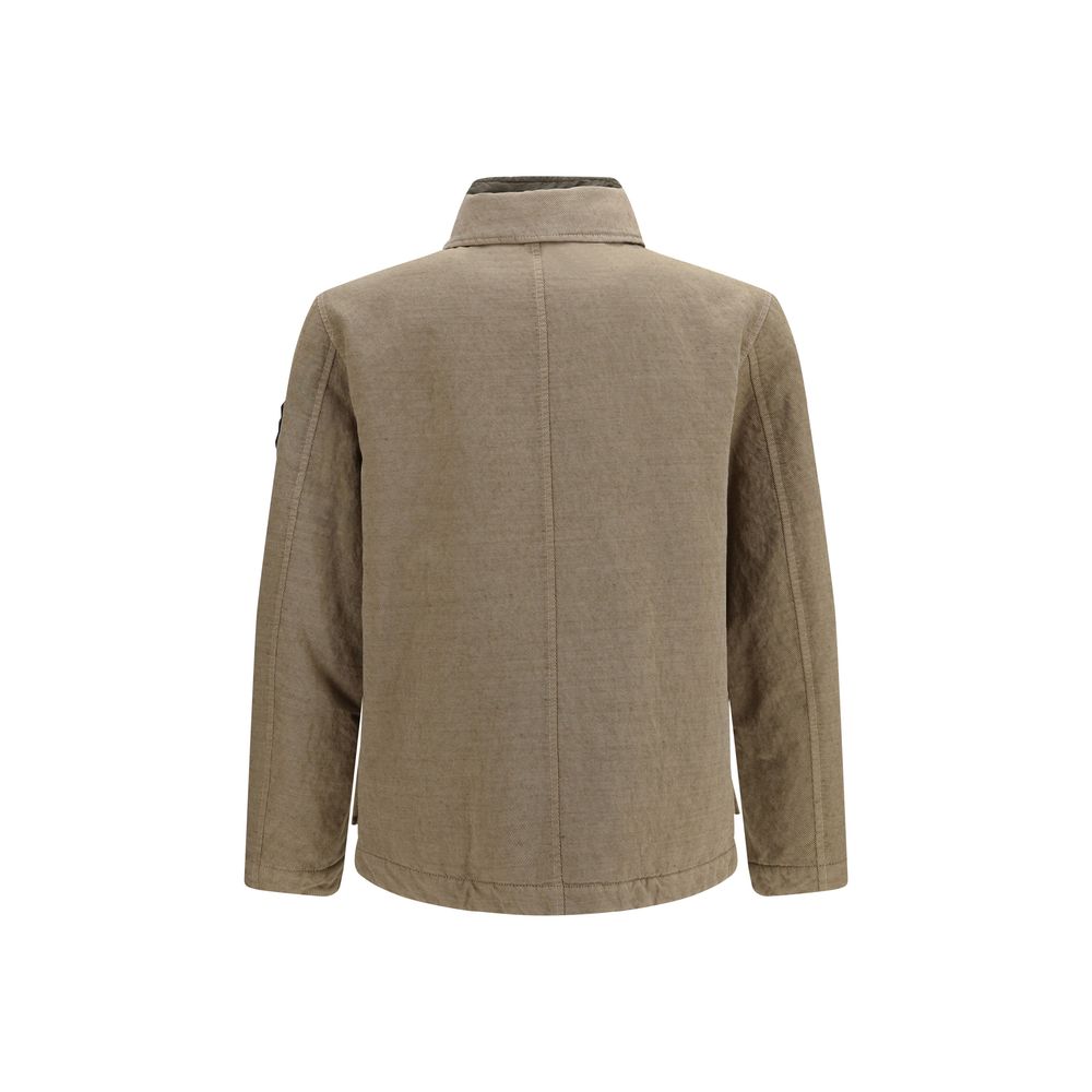 Indulge in the exquisite Stone Island Brown Cotton Full-Length Jacket, a masterful blend of cotton and wool, embodying timeless elegance and unparalleled warmth for the discerning individual.