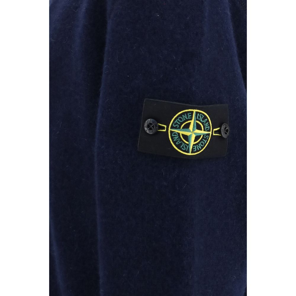 Indulge in the exquisite Stone Island Blue Alpaca Vicugna Pacos Cardigan, a masterpiece of luxurious craftsmanship, blending softness and sophistication for a timeless wardrobe essential.