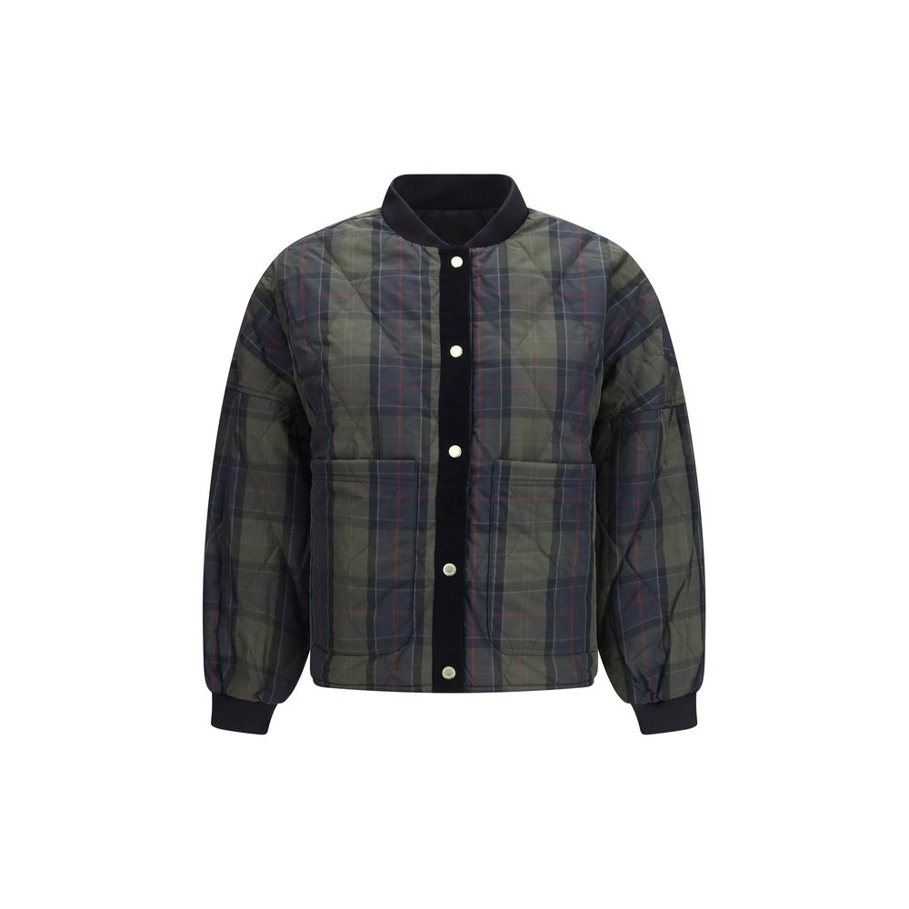 Indulge in the exquisite Barbour Black Polyester Bomber, a reversible quilted masterpiece that embodies timeless elegance and unparalleled craftsmanship for the discerning individual.