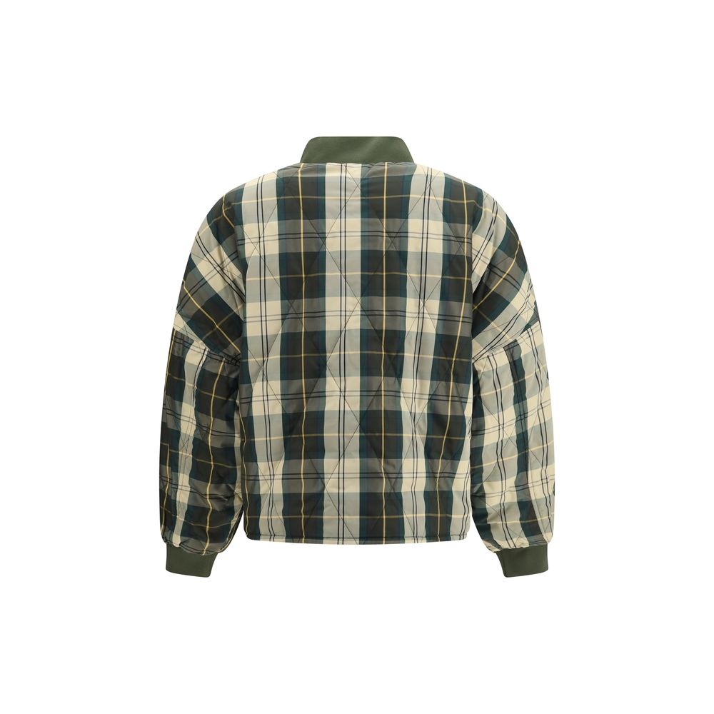 Experience unparalleled elegance with the Barbour Bicolor Polyester Shell Jacket, a reversible masterpiece that embodies sophistication and timeless style for discerning individuals.