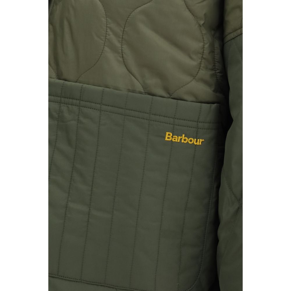 Indulge in the exquisite Barbour Bicolor Polyester Shell Jacket, a reversible masterpiece that embodies luxury and versatility for the discerning individual.