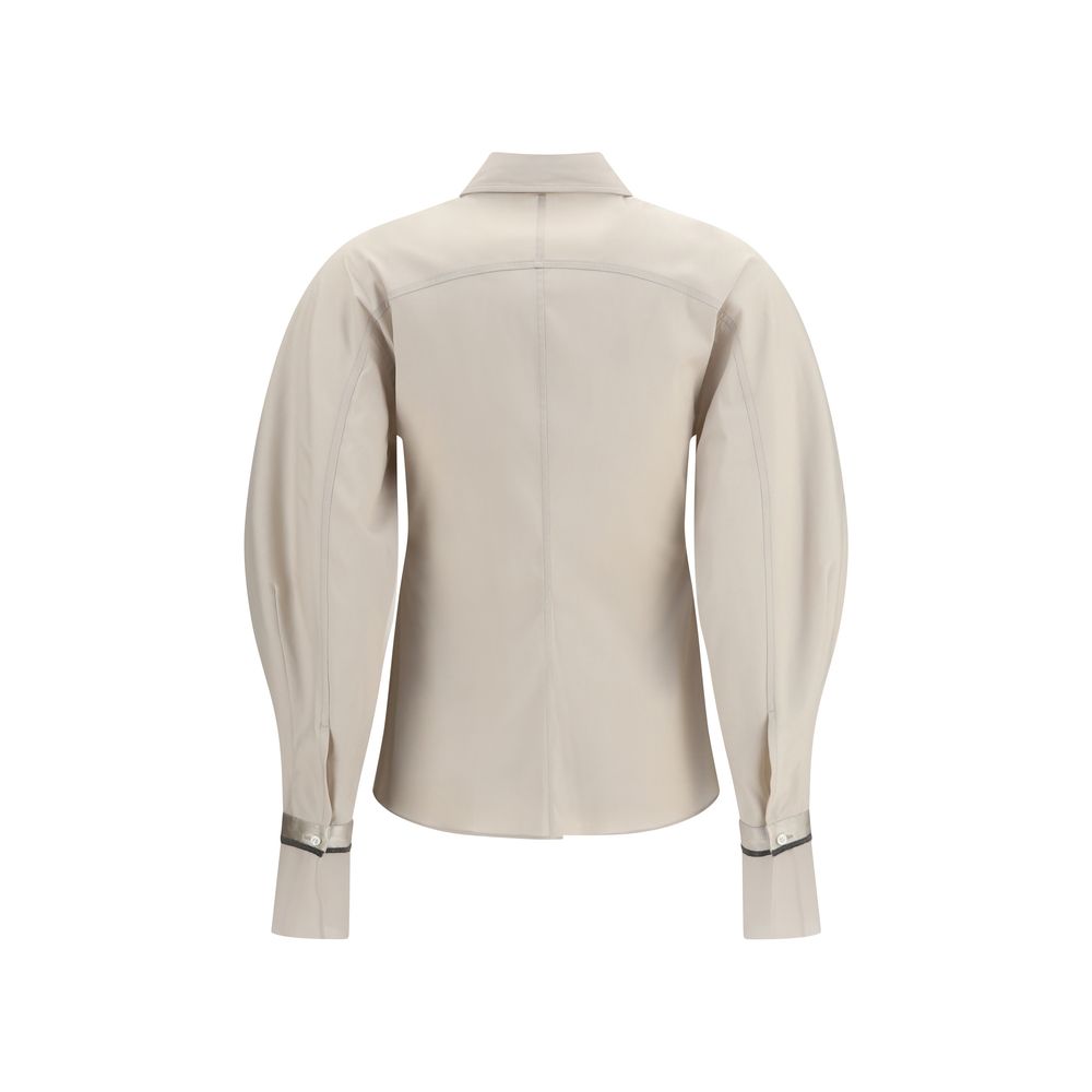 Elevate your wardrobe with the Brunello Cucinelli Beige Cotton Shirt, a masterpiece of stretch cotton poplin and silk cuffs, embodying sophisticated luxury and timeless elegance.