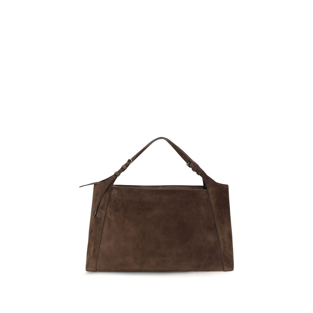 Indulge in the exquisite Brunello Cucinelli Brown Suede Leather Handbag, a masterpiece of craftsmanship and luxury, perfect for elevating your everyday elegance.