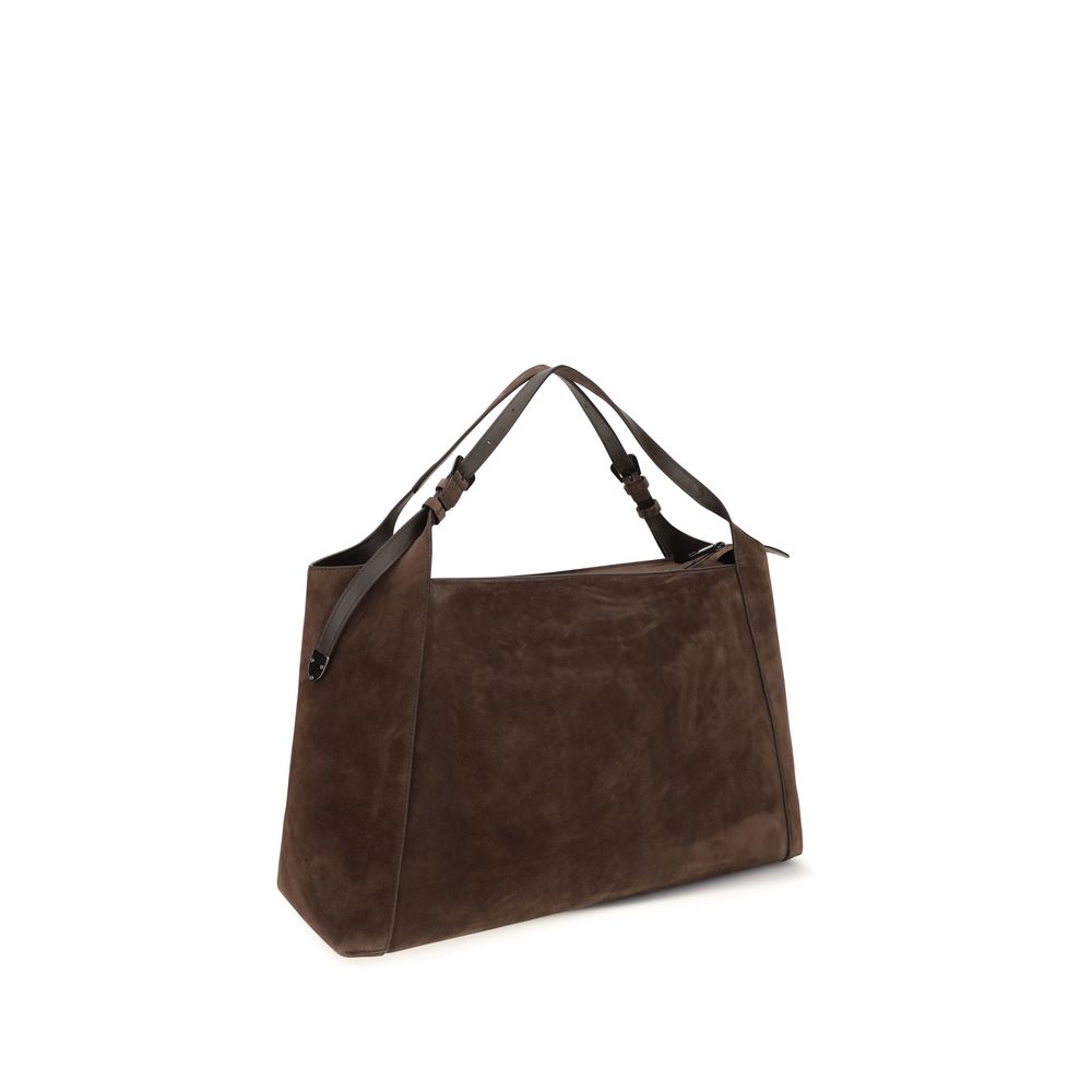 Indulge in the exquisite Brunello Cucinelli Brown Suede Leather Handbag, a harmonious blend of luxurious craftsmanship and timeless elegance, perfect for the discerning individual.