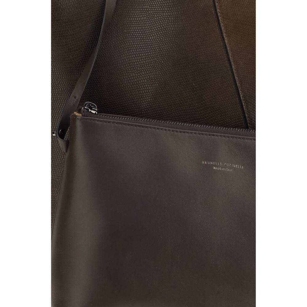 Indulge in the exquisite Brunello Cucinelli Brown Calf Leather Bos Taurus Handbag, a masterpiece of Italian craftsmanship that elevates your style with its luxurious design and refined details.