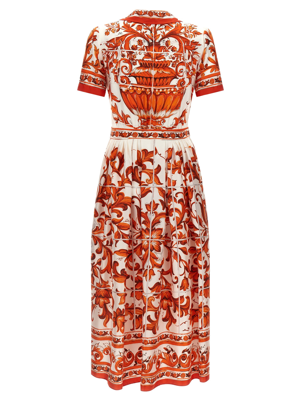 Indulge in the exquisite Dolce & Gabbana Orange Silk Midi Dress, a masterpiece of Italian craftsmanship that elevates your elegance and allure for any occasion.