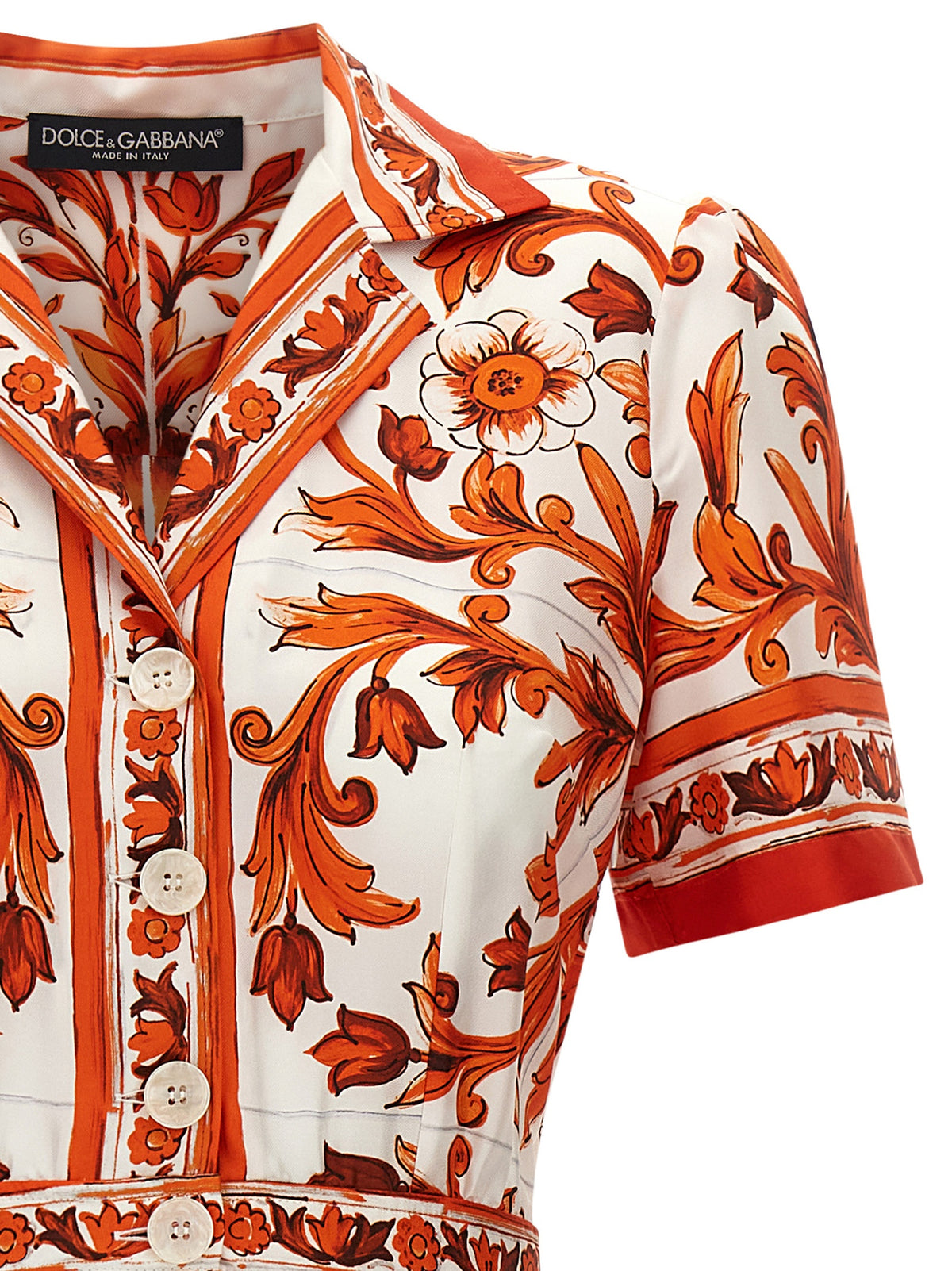 Indulge in the exquisite Dolce & Gabbana Orange Silk Midi Dress, a masterpiece of Italian craftsmanship that embodies timeless elegance and sophistication for any occasion.