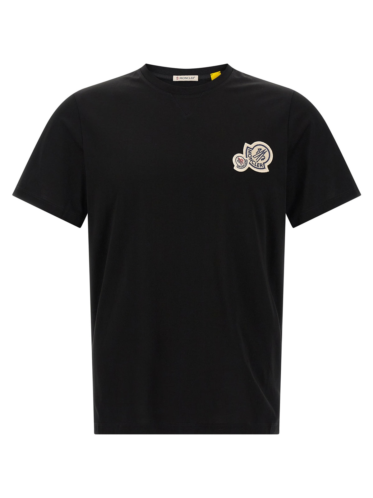 Elevate your wardrobe with the Moncler Black Cotton T-Shirt, a masterpiece of craftsmanship in pure cotton, embodying timeless luxury and effortless sophistication.