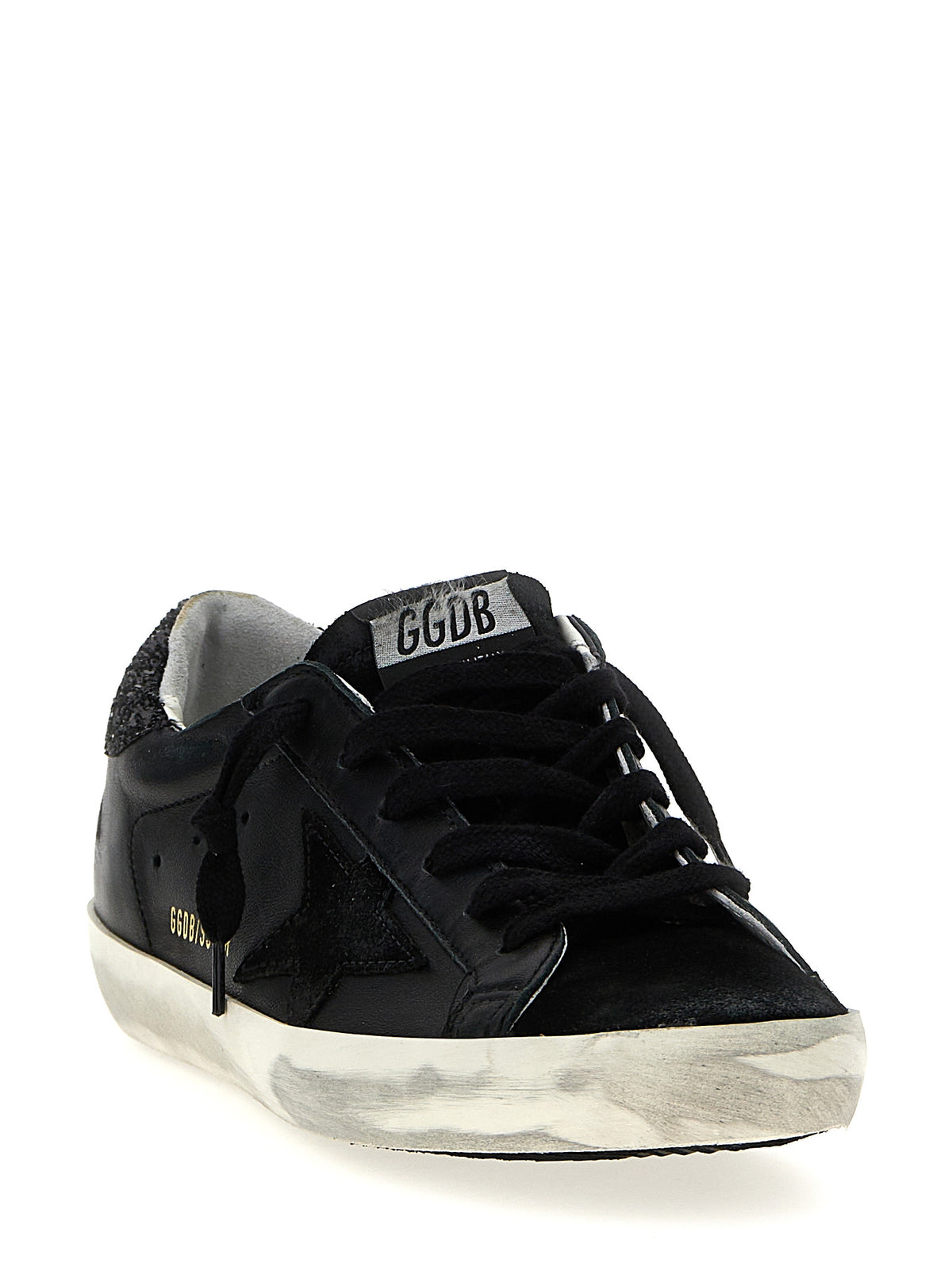 Elevate your style with Golden Goose's Black Leather Low Top Sneakers, where exquisite craftsmanship meets edgy design, perfect for the discerning fashion connoisseur.