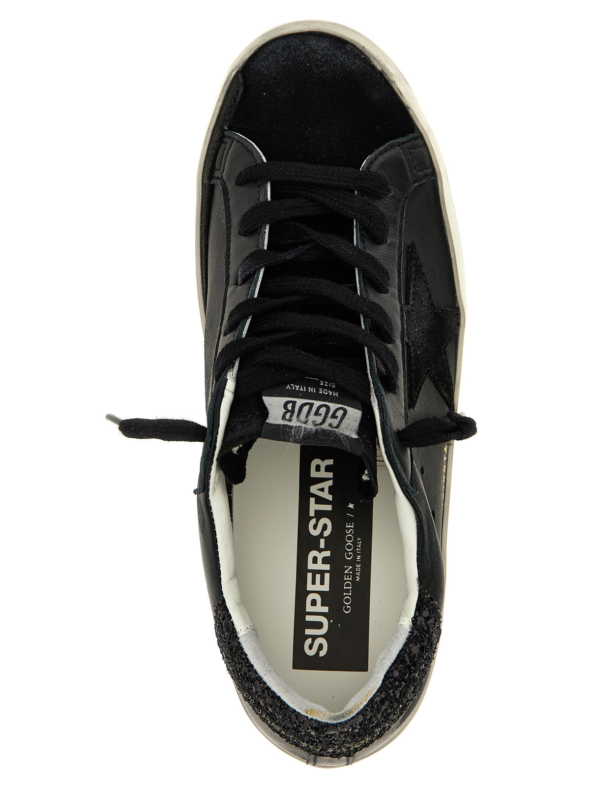 Step into elegance with Golden Goose's Black Leather Low Top Sneakers, where exquisite craftsmanship meets bold design, perfect for the discerning fashion aficionado.