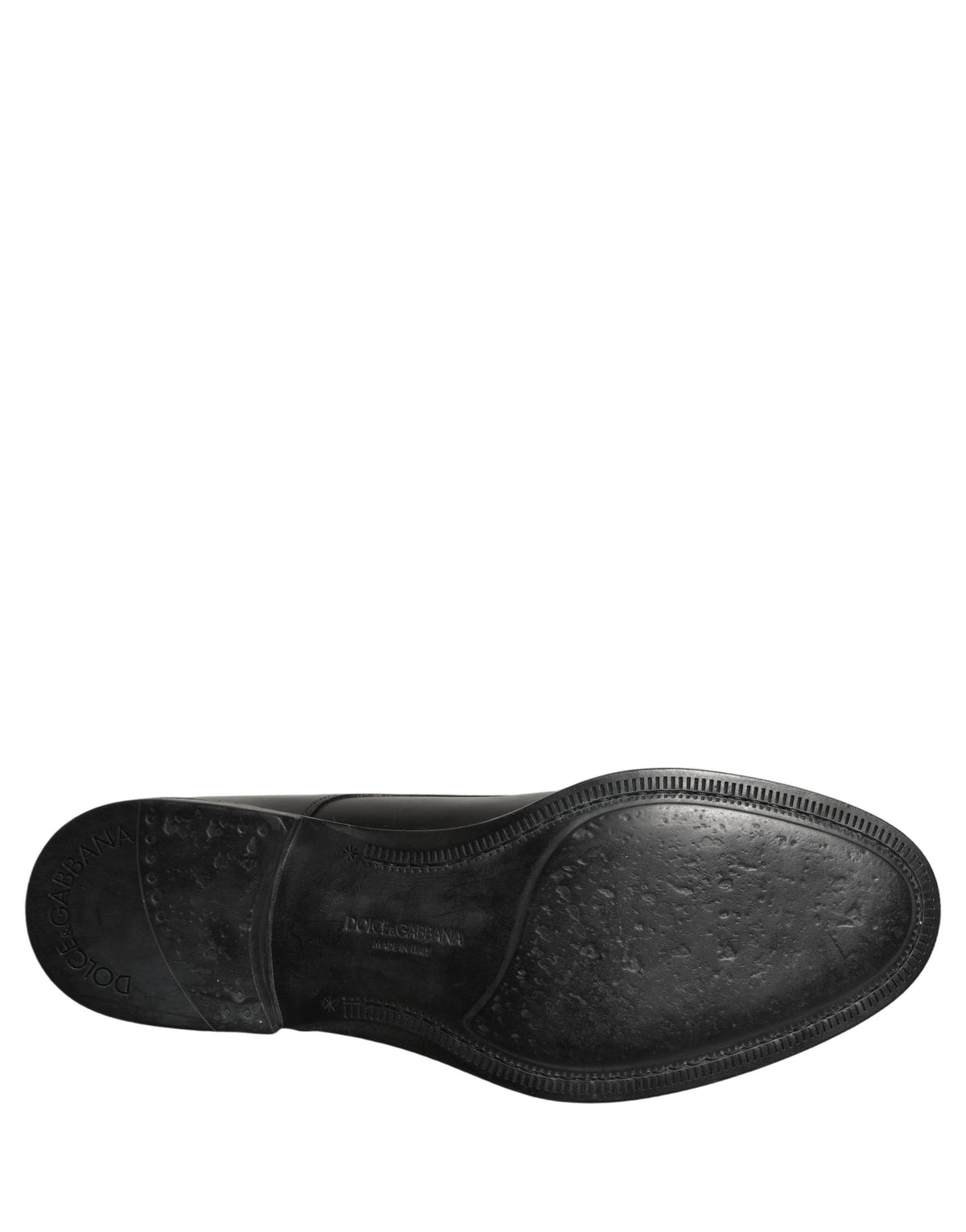Indulge in the exquisite craftsmanship of Dolce & Gabbana's Black Calfskin Leather Derby shoes, where timeless elegance meets unparalleled luxury for the discerning connoisseur.