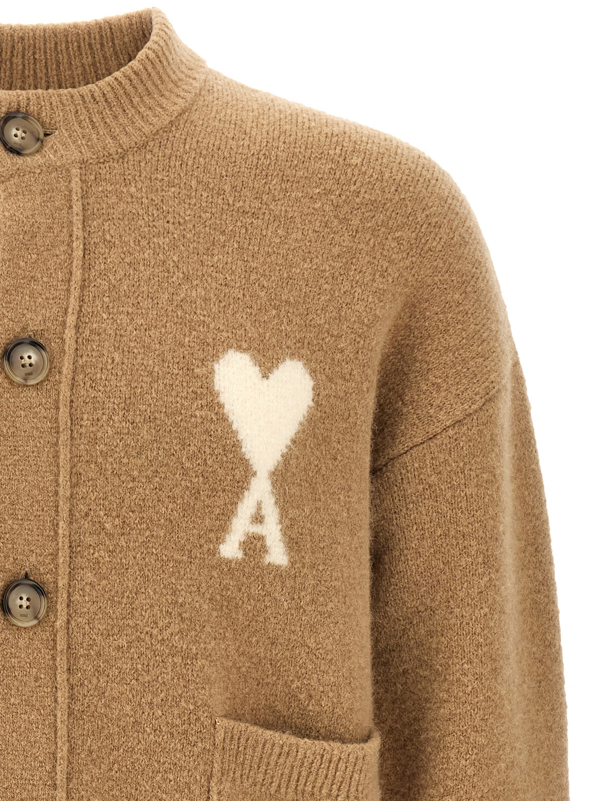Embrace the allure of refined elegance with the Ami Paris Beige Alpaca Leather Cardigan, a masterpiece of contemporary knitwear crafted from luxurious alpaca and wool.