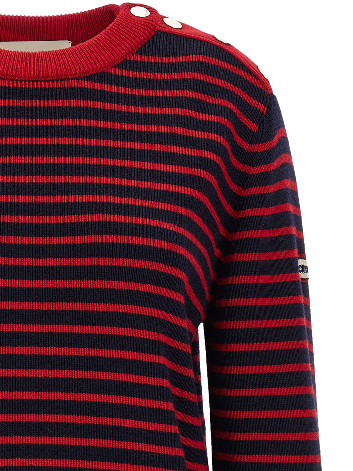 Indulge in the AMI PARIS Blue Wool Cardigan, a timeless masterpiece of craftsmanship and elegance, perfect for elevating any wardrobe with its luxurious 100% pure wool.