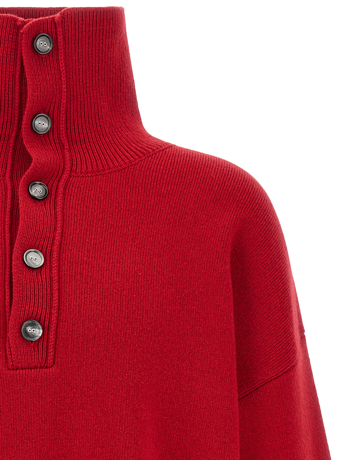 Indulge in the exquisite craftsmanship of the Ami Paris Red Wool Cardigan, a luxurious staple that embodies sophistication and Parisian elegance for the discerning wardrobe.