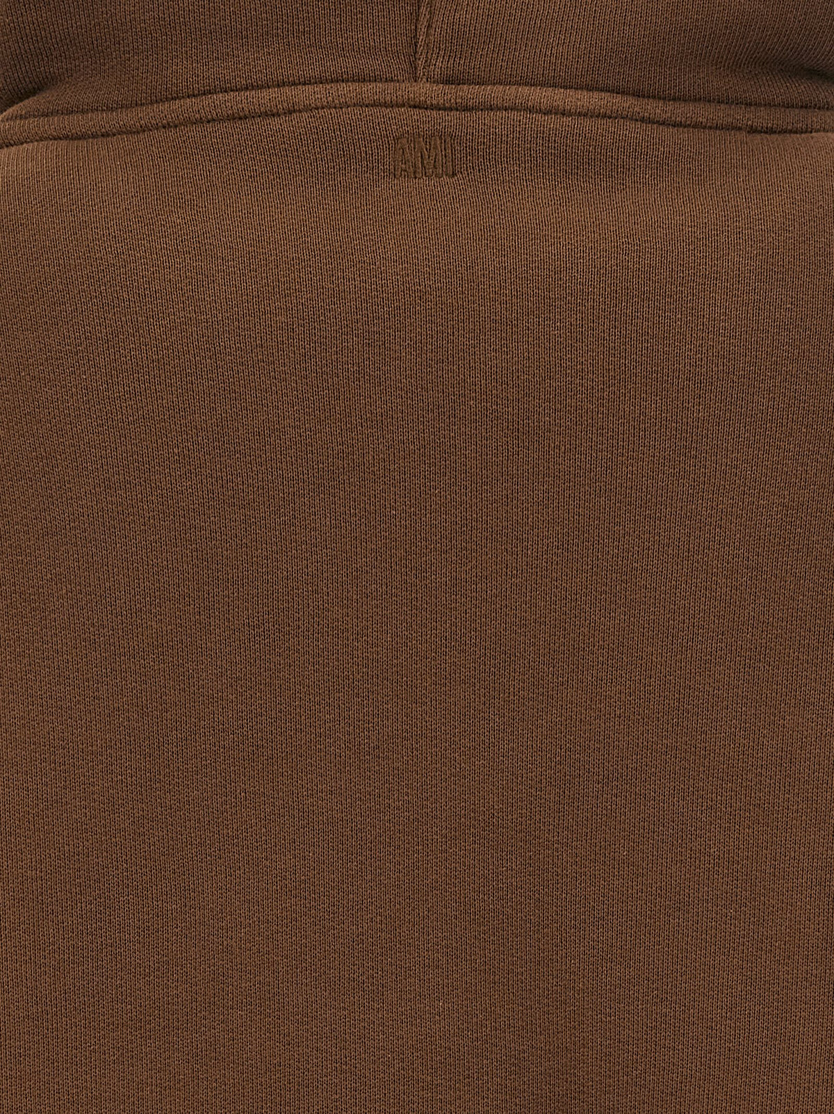 Indulge in the AMI Paris Brown Cotton Hoodie, where structured elegance meets casual sophistication, crafted for those who embody timeless luxury and style.