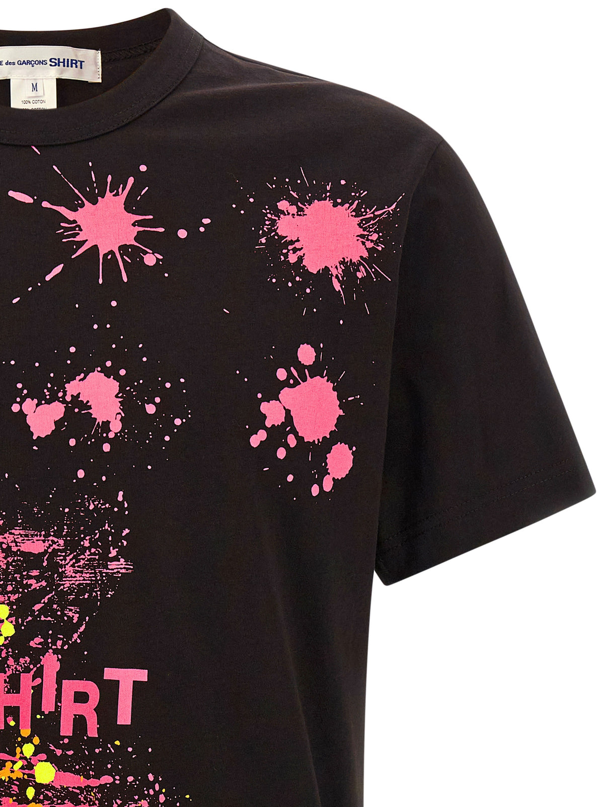 Elevate your wardrobe with the Comme Des Garçons Black Cotton T-Shirt, a bold expression of artistry and comfort, perfect for those who embrace luxury and individuality.